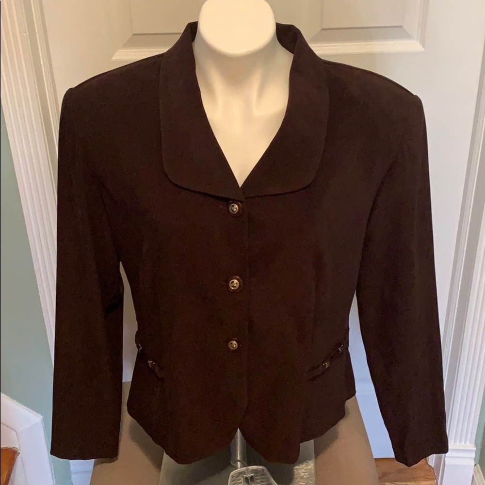 Never worn woman’s suit (skirt and blazer)